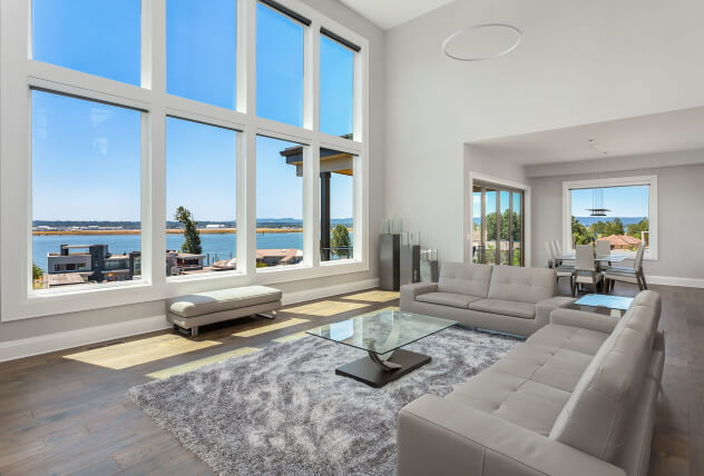 Spacious living room with waterfront view